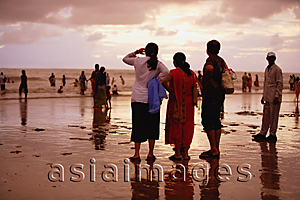 Asia Images Group - People on the beach at sunset, Mumbai, India