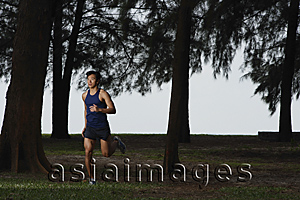 Asia Images Group - Man running through park