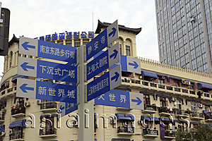 Asia Images Group - Road sign in front of a French style apartment,  Shanghai