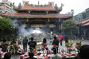Asia Images Group - Worshipper at Lungshan Temple, Taipei, Taiwan