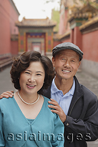 Asia Images Group - A man and a woman smile at the camera together
