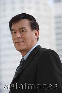 Asia Images Group - Portrait of businessman looking at camera