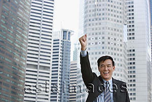 Asia Images Group - Man raising his fist