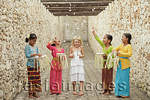 Asia Images Group - Balinese girls and European girl