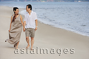 Asia Images Group - Mature couple walking at the beach