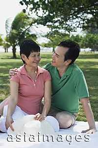 Asia Images Group - Mature couple having a picnic in the park