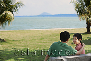 Asia Images Group - Mature couple in a park near the beach