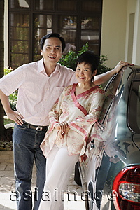 Asia Images Group - Mature couple smiling at camera