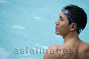 Asia Images Group - Young man in swimming pool
