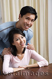 Asia Images Group - Young couple smiling at camera