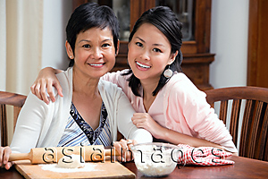 Asia Images Group - Mother and daughter baking together