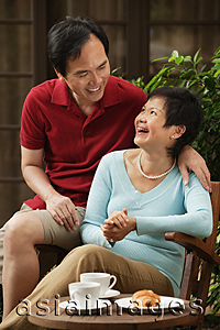 Asia Images Group - Mature couple laughing and looking at each other