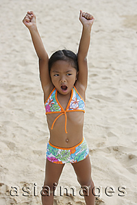 Asia Images Group - Girl raising arms and shouting