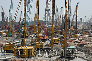 Asia Images Group - Cranes on a construction site