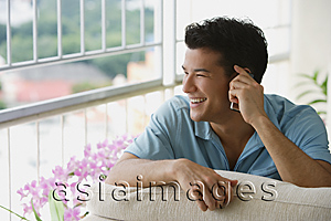 Asia Images Group - Young man talking on the phone