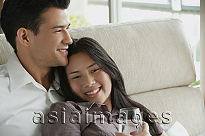 Asia Images Group - Young couple laughing together