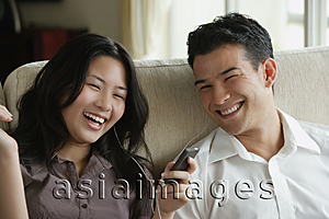 Asia Images Group - Young couple laughing together