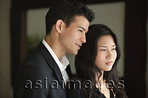 Asia Images Group - Young couple looking into distance