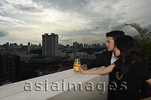 Asia Images Group - Young couple looking into distance