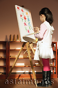 Asia Images Group - Girl painting on canvas