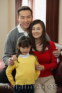 Asia Images Group - Young family smiling at camera