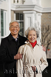 Asia Images Group - Elderly couple smiling at camera