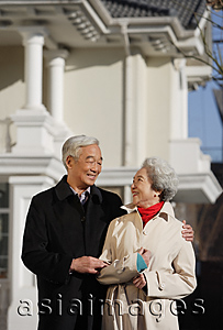 Asia Images Group - Elderly couple looking at each other