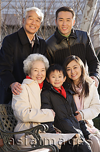 Asia Images Group - Family in the park smiling at camera