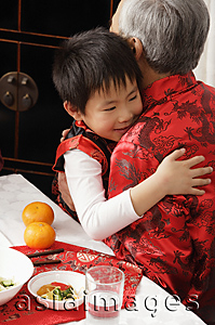 Asia Images Group - Boy hugging grandfather
