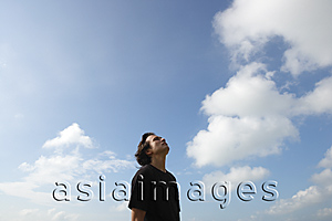 Asia Images Group - Man looking at the sky