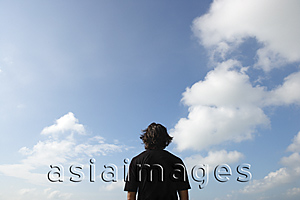 Asia Images Group - Man looking at the sky