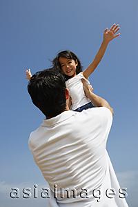 Asia Images Group - Father picking up daughter