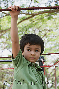 Asia Images Group - Young boy playing at the park