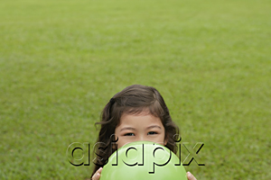 AsiaPix - Girl hiding behind green balloon