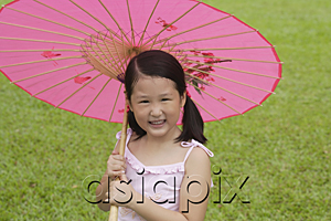 AsiaPix - Girl using pink traditional Chinese paper umbrella, looking at camera