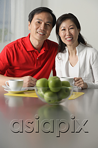 AsiaPix - Mature couple at home, looking at camera, portrait
