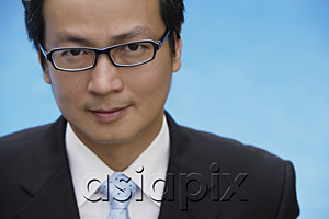 AsiaPix - Businessman looking at camera, head shot