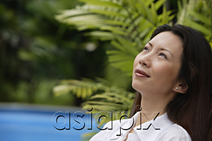 AsiaPix - Woman outdoors, looking away, head shot