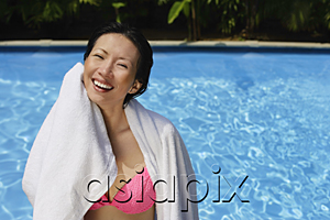 AsiaPix - Woman wiping herself with a towel, swimming pool in the background