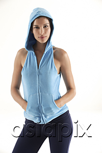 AsiaPix - Woman looking at camera, hands in pocket of hooded vest