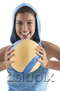AsiaPix - woman holding volleyball, smiling, looking at camera