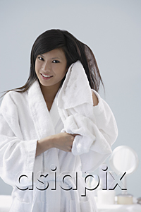 AsiaPix - woman wearing bathrobe, towel drying hair, smiling at camera