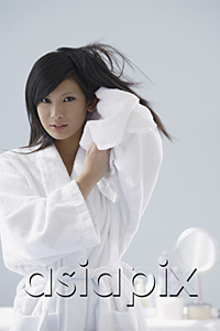 AsiaPix - woman wearing bathrobe, towel drying hair, looking at camera