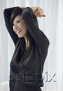 AsiaPix - woman smiling, stretching, relaxing