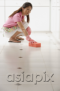 AsiaPix - Woman cleaning floor with big pink sponge