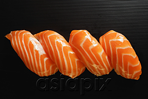 AsiaPix - Four pieces of Salmon Sushi, nigiri on rice ball