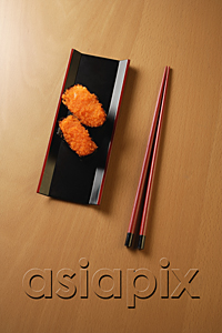 AsiaPix - two pieces of sushi, chopsticks, tobiko gunkan, fish roe
