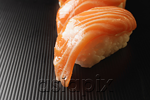 AsiaPix - two pieces of salmon sushi, nigiri on rice ball