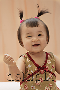 AsiaPix - baby girl looking at camera, smiling