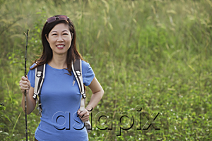 AsiaPix - Woman hiking in nature, outdoors